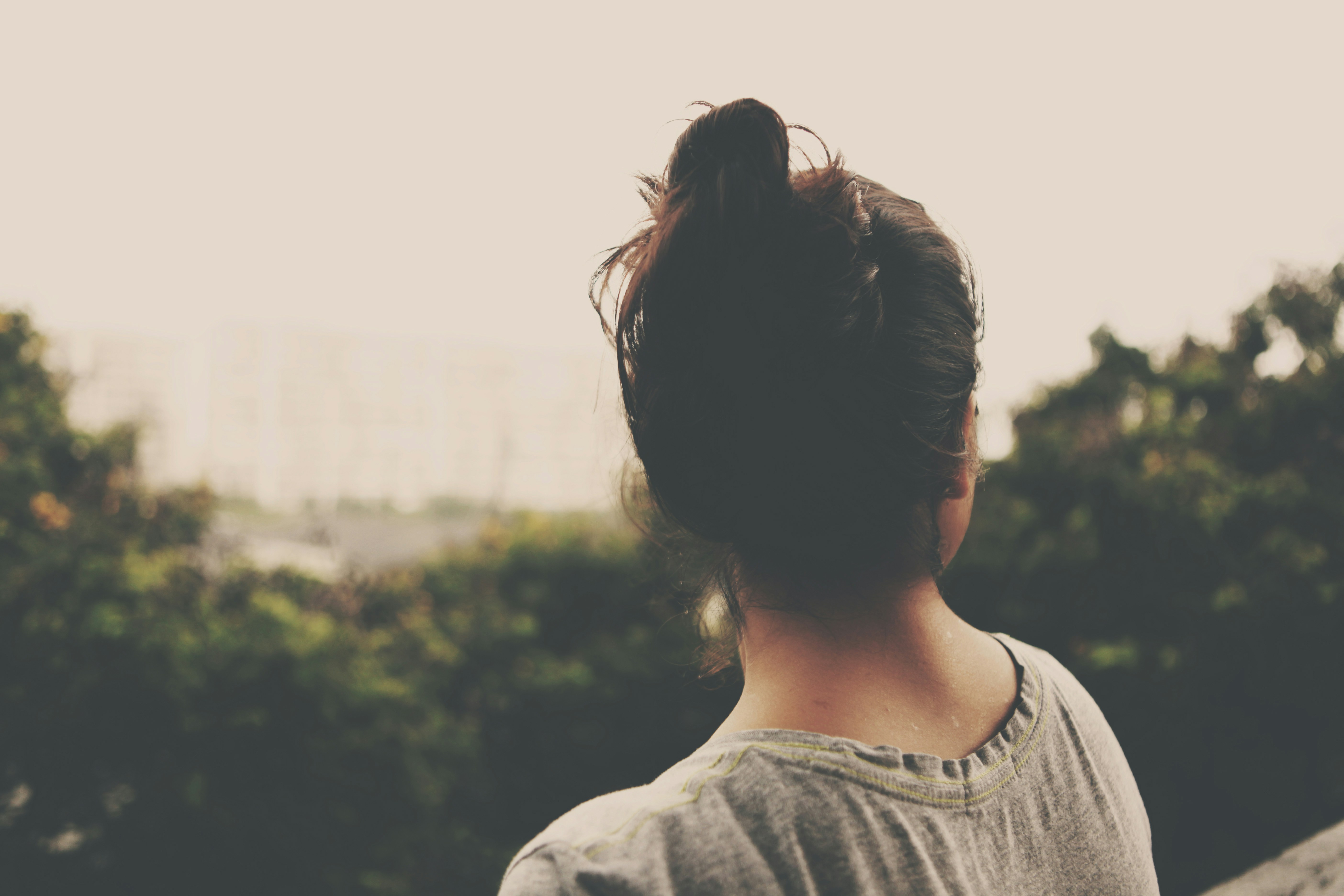 Woman looking out at new horizons — independence after divorce