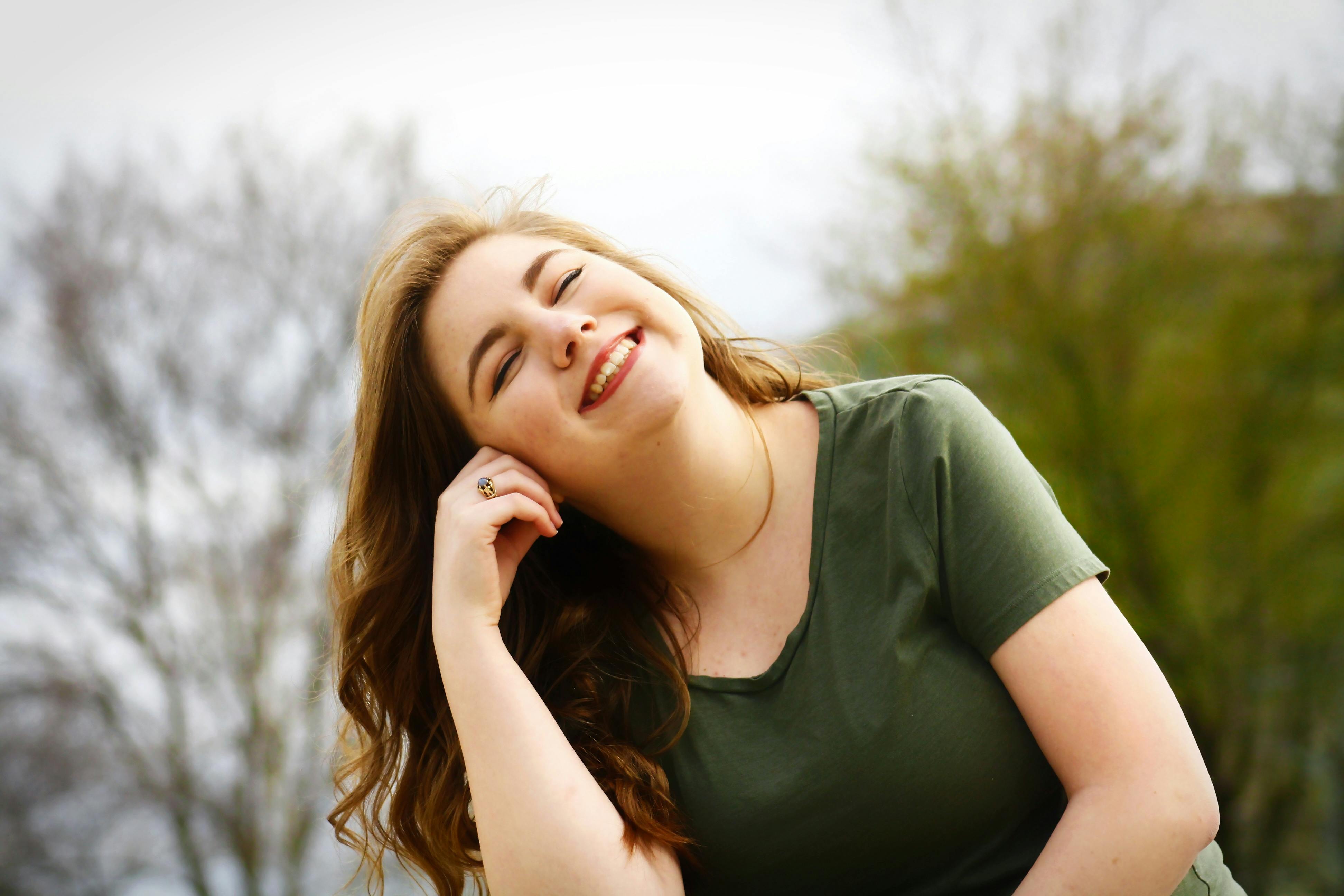 Woman smiling and thriving after divorce